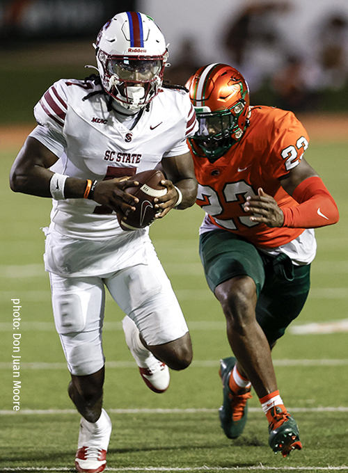 Florida A&M defensive lineman Allen Smith, Jr. chases after South Carolina State quarterback Eric Phoenix during the week 1 game between former MEAC teams in Bragg Stadium.