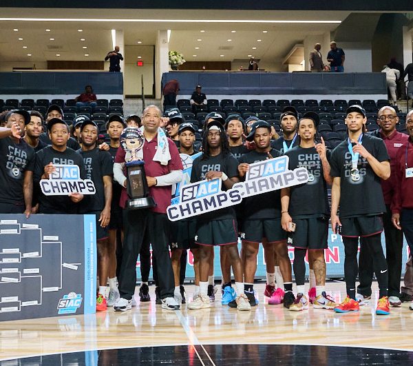 Morehouse Maroon Tigers team photo with SIAC Championship trophy