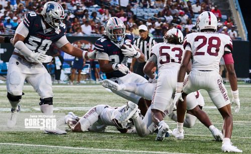 Scroggins Leads Howard to First Win