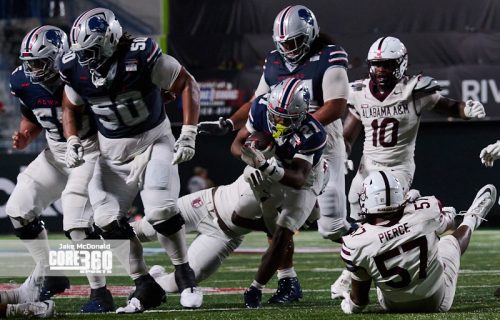 Scroggins Leads Howard to First Win