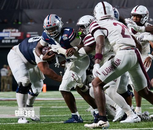 Scroggins Leads Howard to First Win