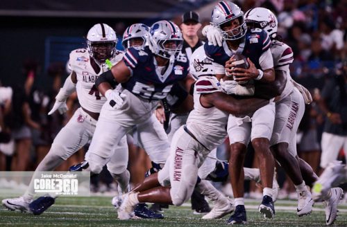 Scroggins Leads Howard to First Win