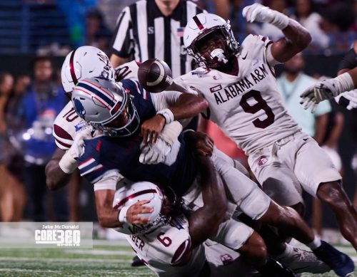 Scroggins Leads Howard to First Win