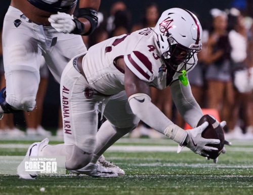 Scroggins Leads Howard to First Win
