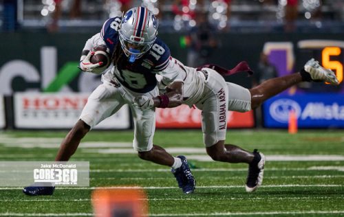 Scroggins Leads Howard to First Win