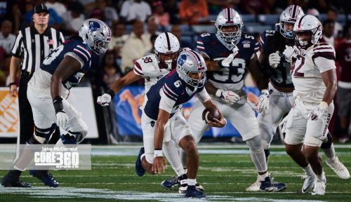 Scroggins Leads Howard to First Win