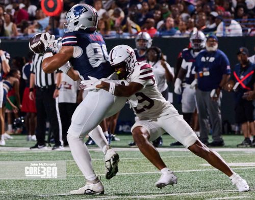 Scroggins Leads Howard to First Win