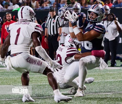 Scroggins Leads Howard to First Win